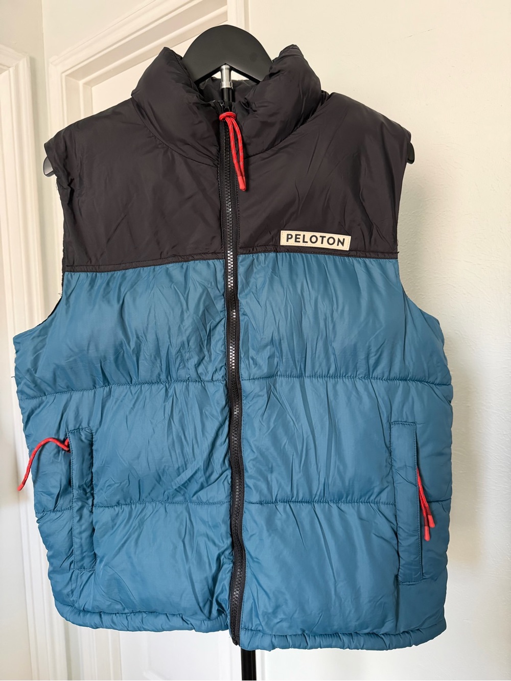 Peloton Men’s Blue and Black Insulated Puffer Vest with Orange Accents